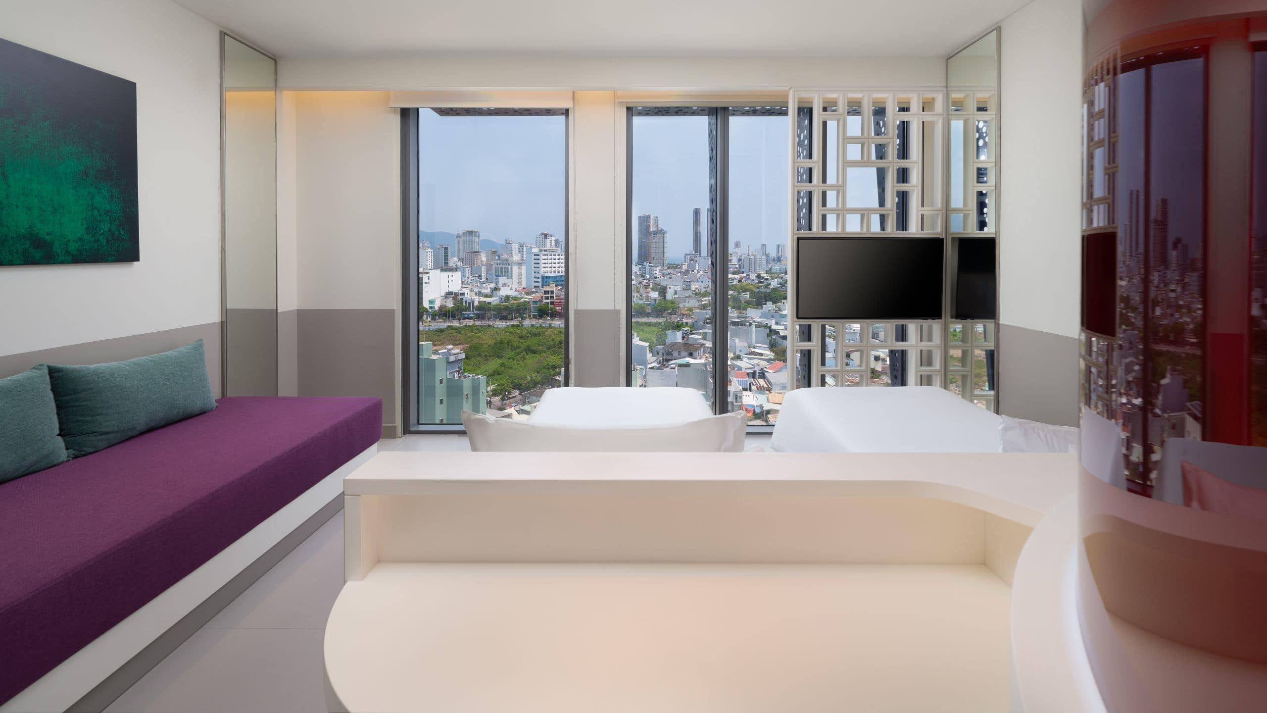 2 of 3 Wink Hotel Danang Riverside Two Twin Beds City View Deluxe With Sofa