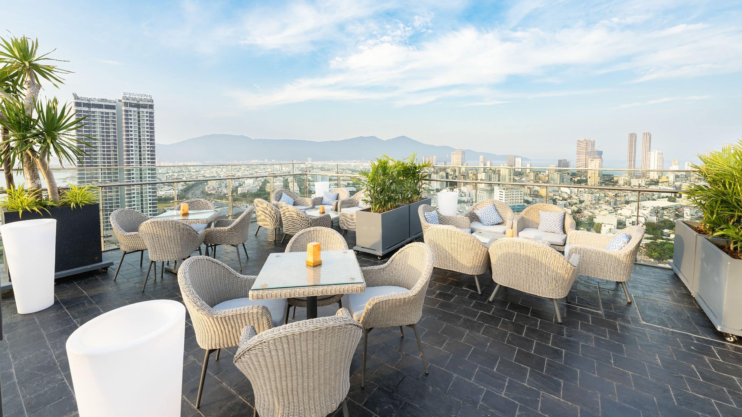 4 of 4 Wink Hotel Danang Riverside Endless Summer Rooftop Bar City Mountain