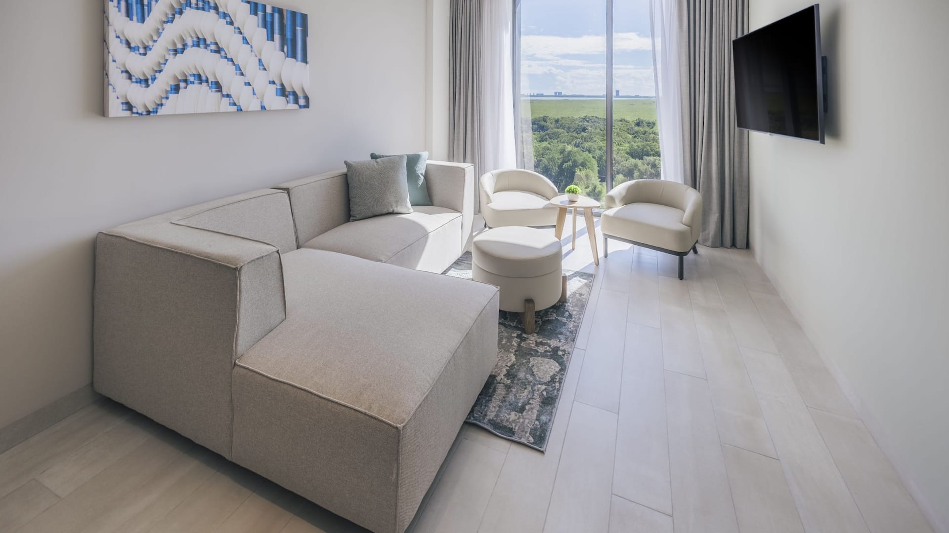 3 of 4 Hyatt Place Cancun Airport One Bedroom King Suite Living Room