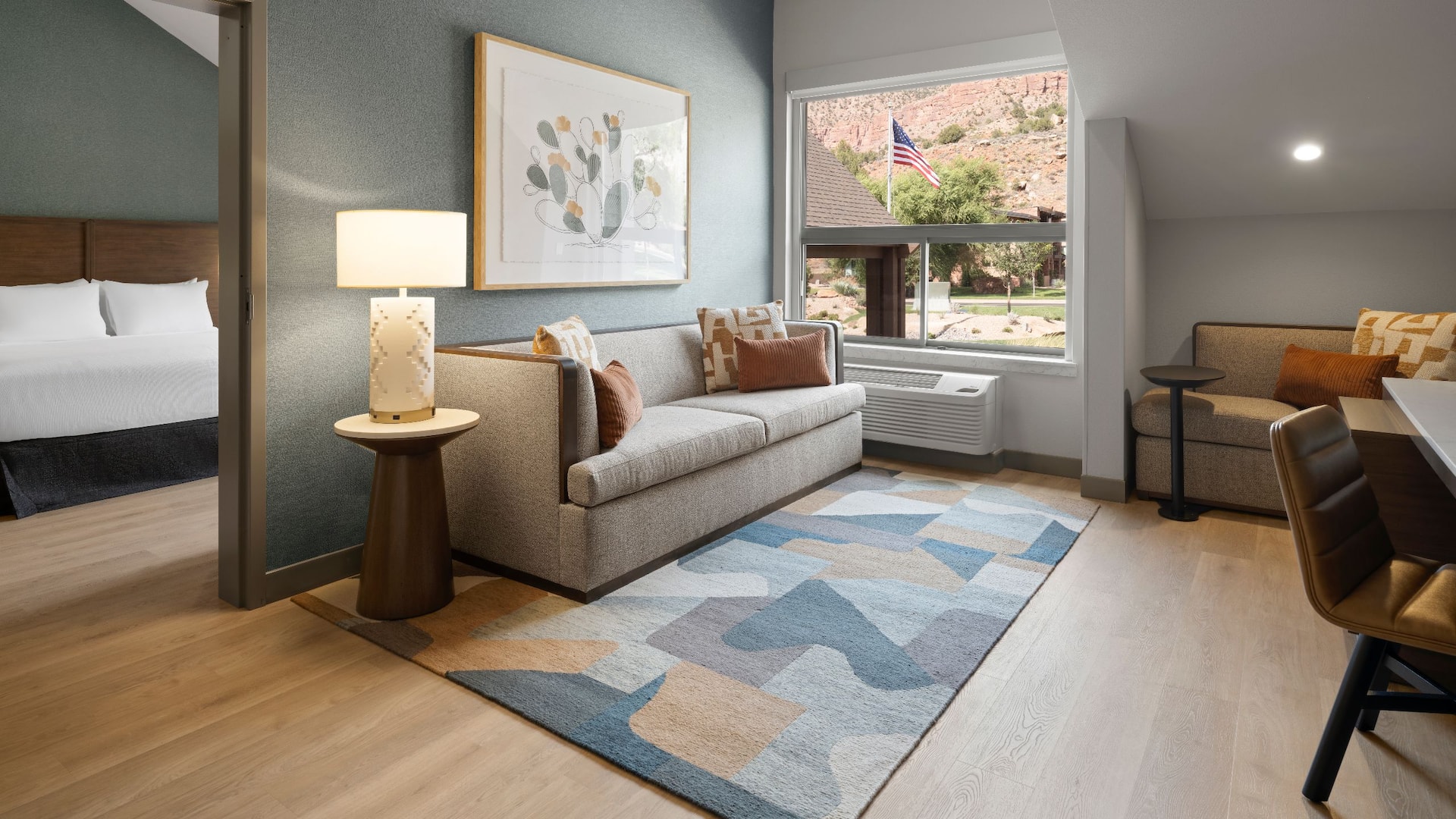 2 of 4 Hyatt Place Springdale / Zion National Park One Bedroom King Suite Living Area