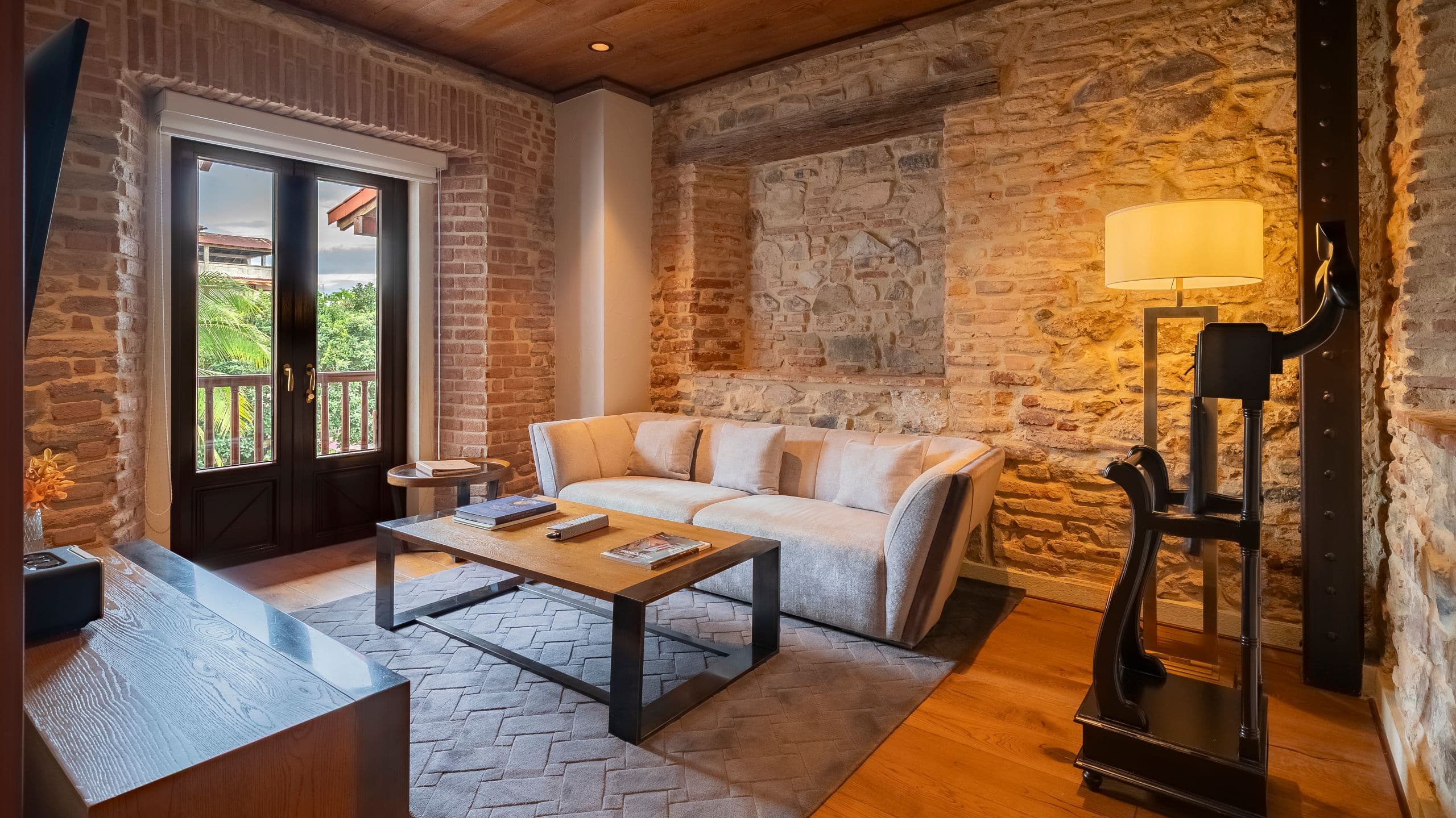 19 of 22 Hotel La Compañía Casco Antiguo One King Bed Suite Cozy Living Room