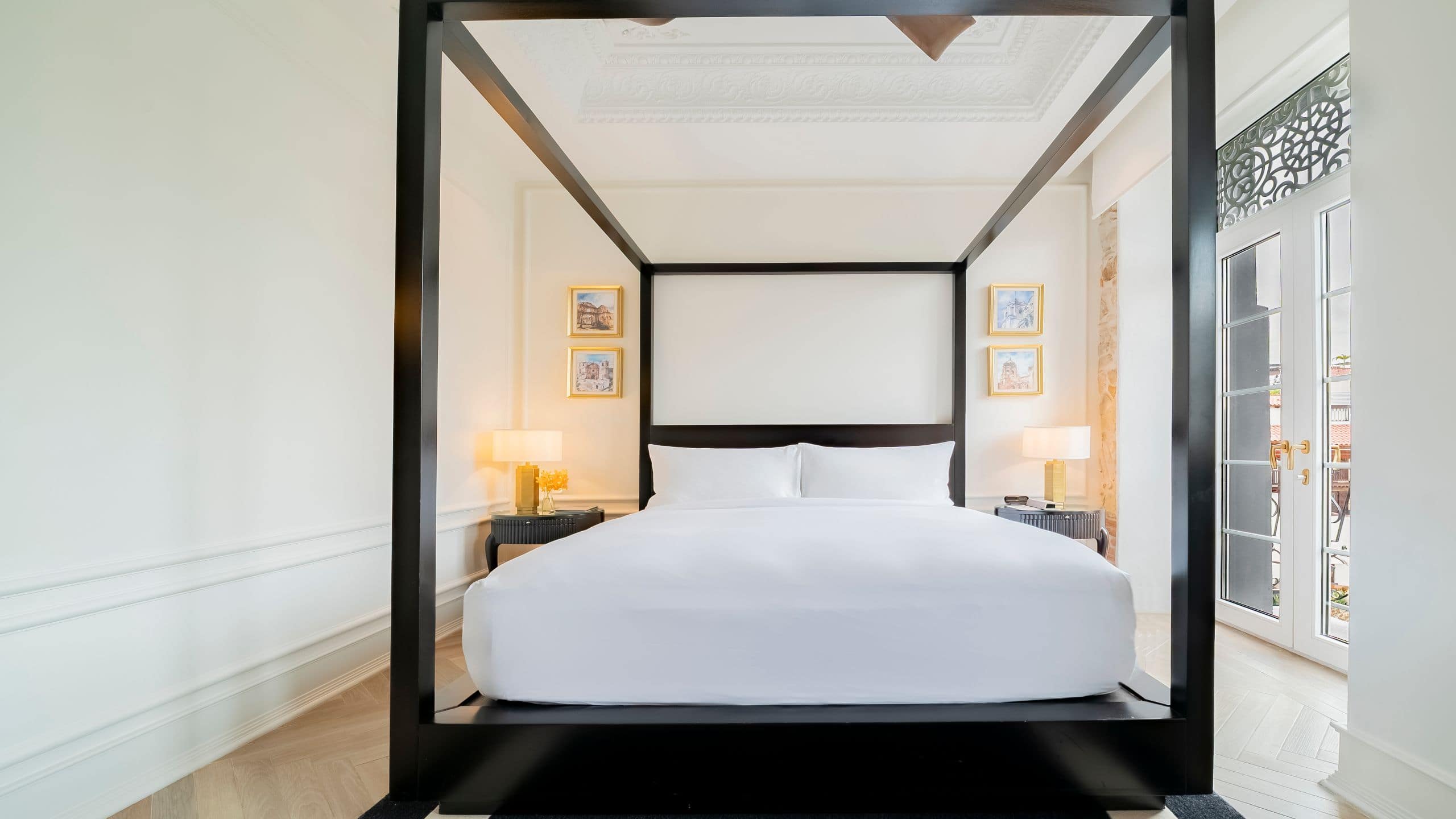 8 of 10 Hotel La Compañía Casco Antiguo One Queen Bed Courtyard View Bed Front View