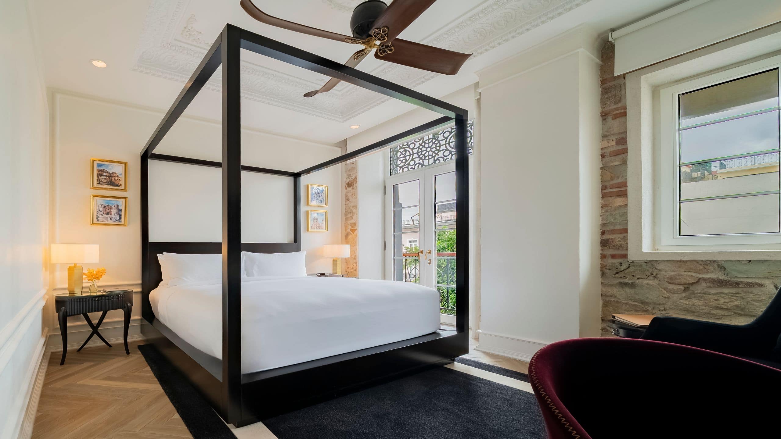 7 of 10 Hotel La Compañía Casco Antiguo One Queen Bed Courtyard View Bedroom