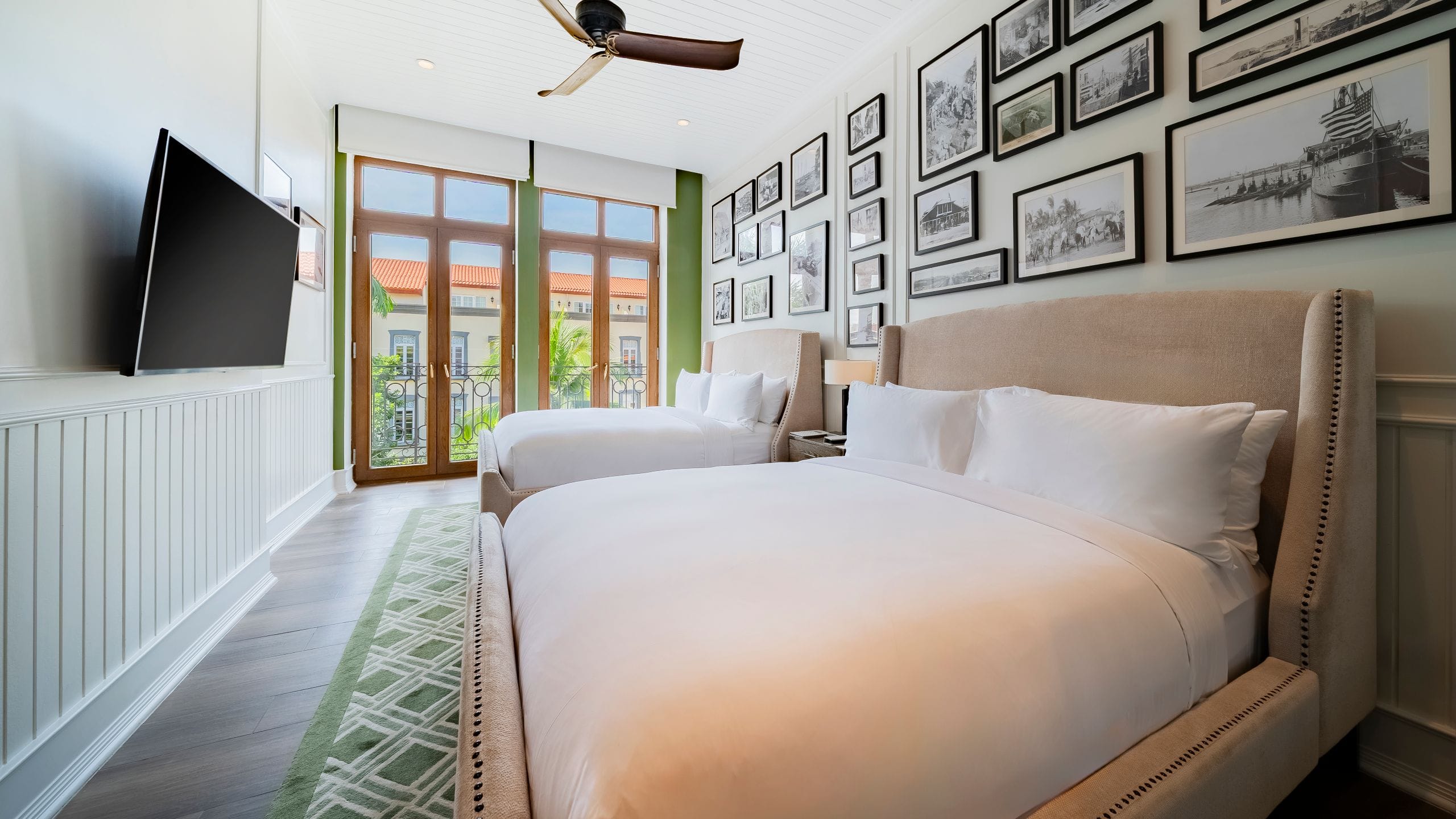 5 of 9 Hotel La Compañía Casco Antiguo Two Queen Beds Courtyard View Beds Side View