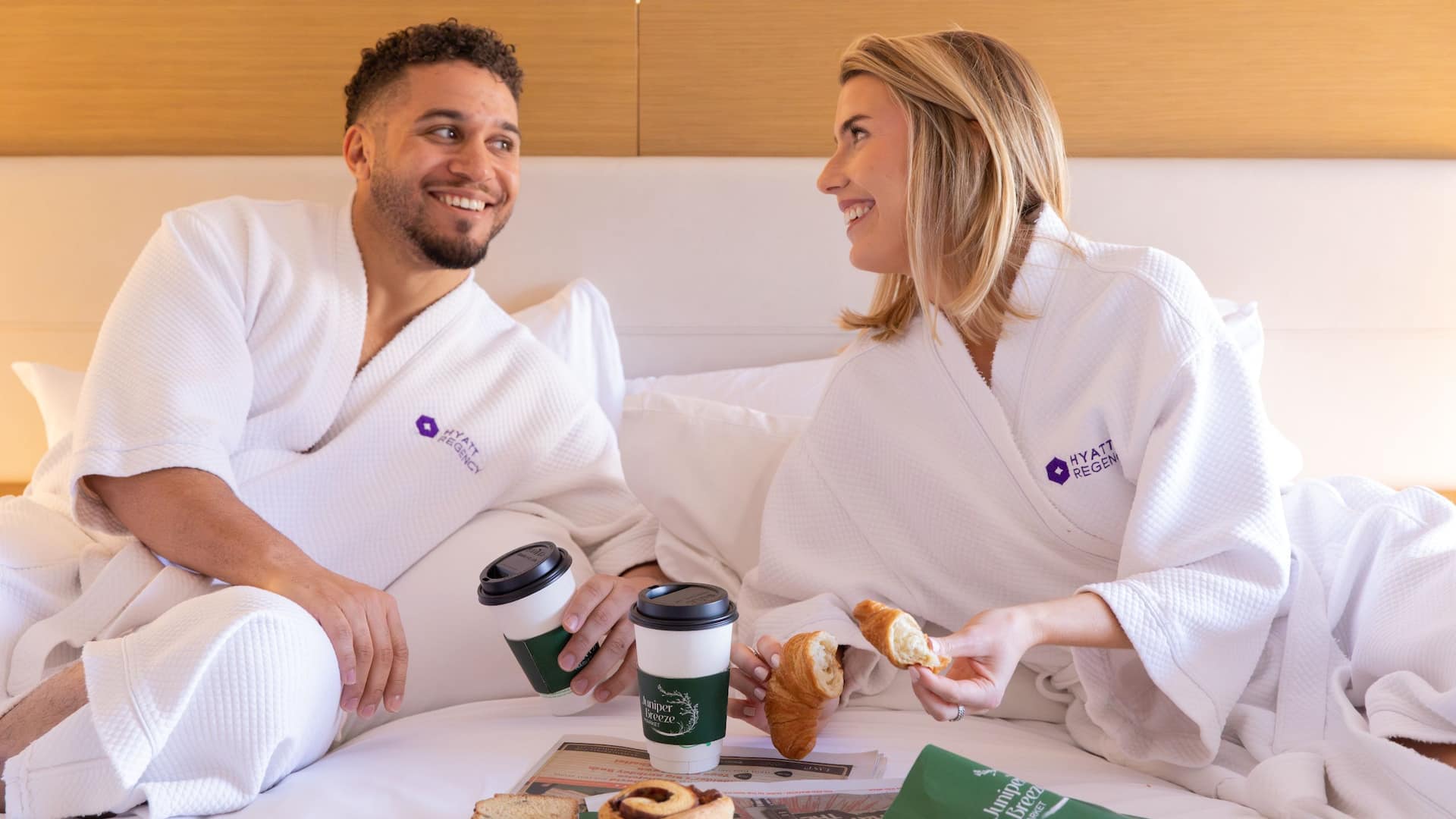 3 of 3 Hyatt Regency Austin Couple Bed Coffee Pastry Robes Talking