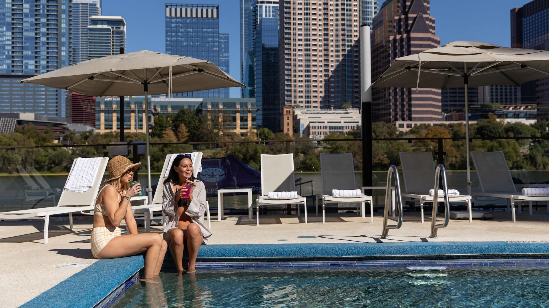 Hyatt Regency Austin Girls Pool Edge Drinking Skyline Lake View