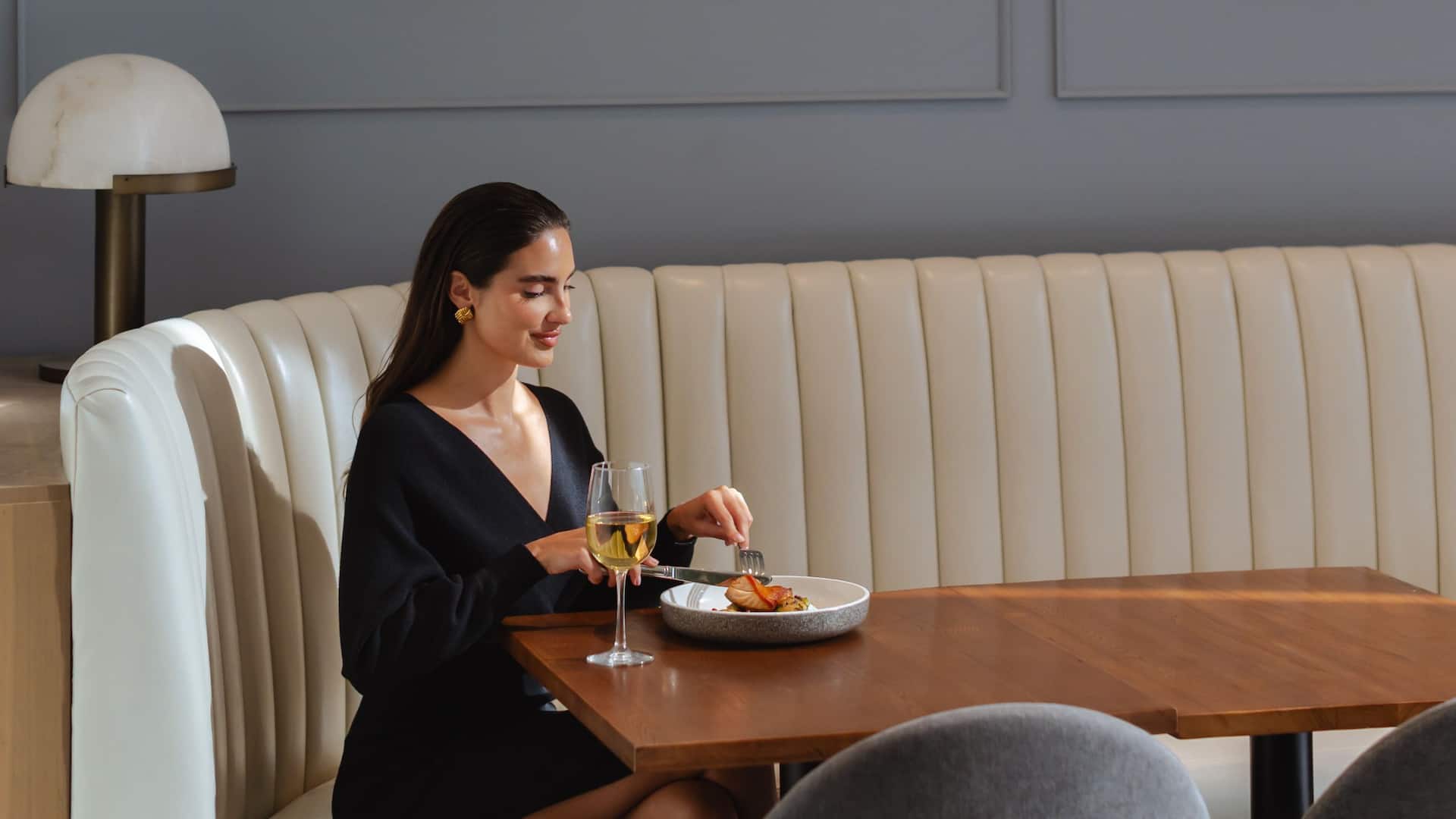 Hyatt Regency Morristown Woman Dining At Lounge