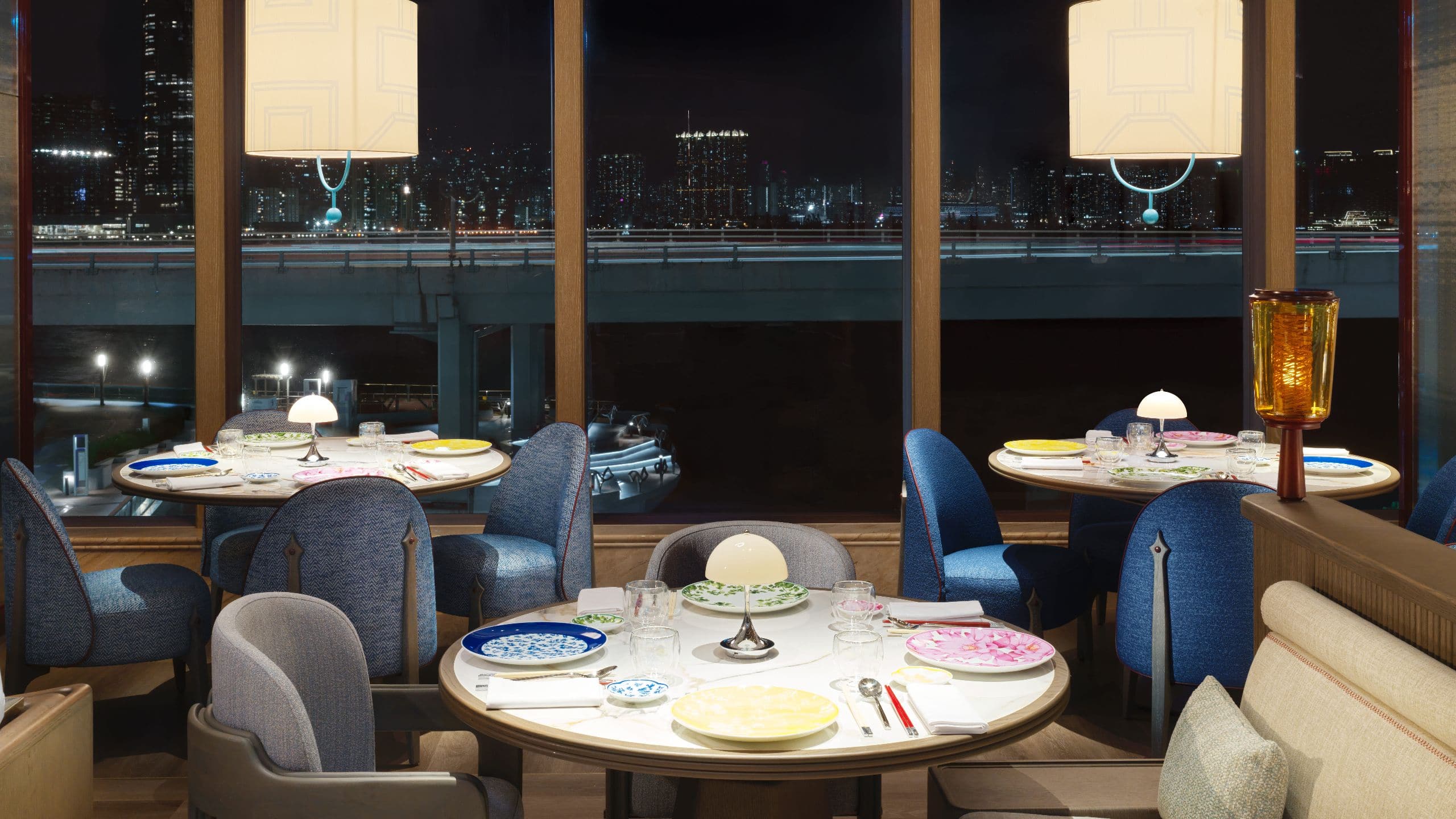 Hyatt Centric Victoria Harbour Hong Kong One Duck Lane Seating Nighttime Harbour View
