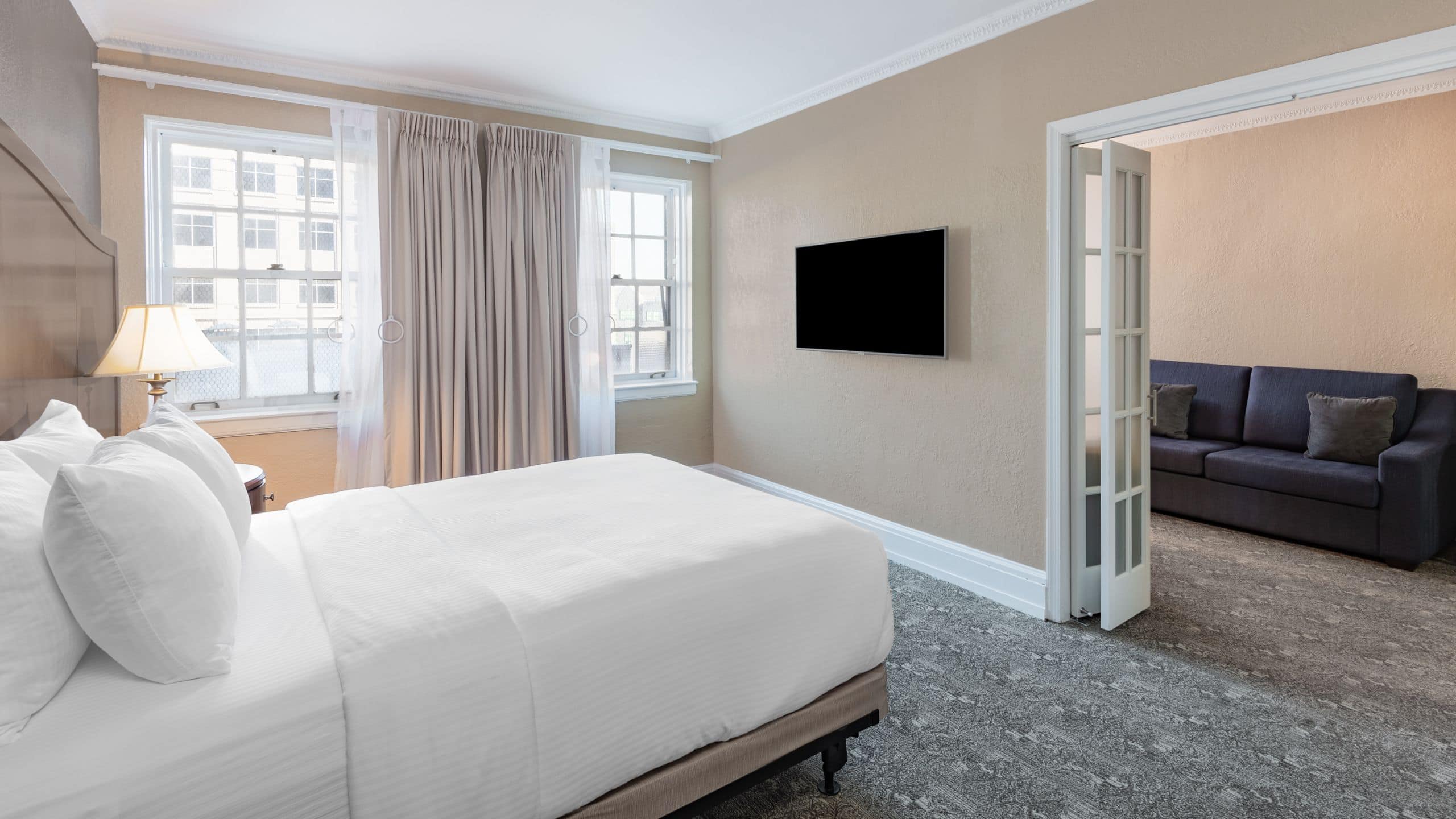 Americus Hotel King Bedroom With Suite Living Room